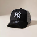 Black and white NY trucker cap